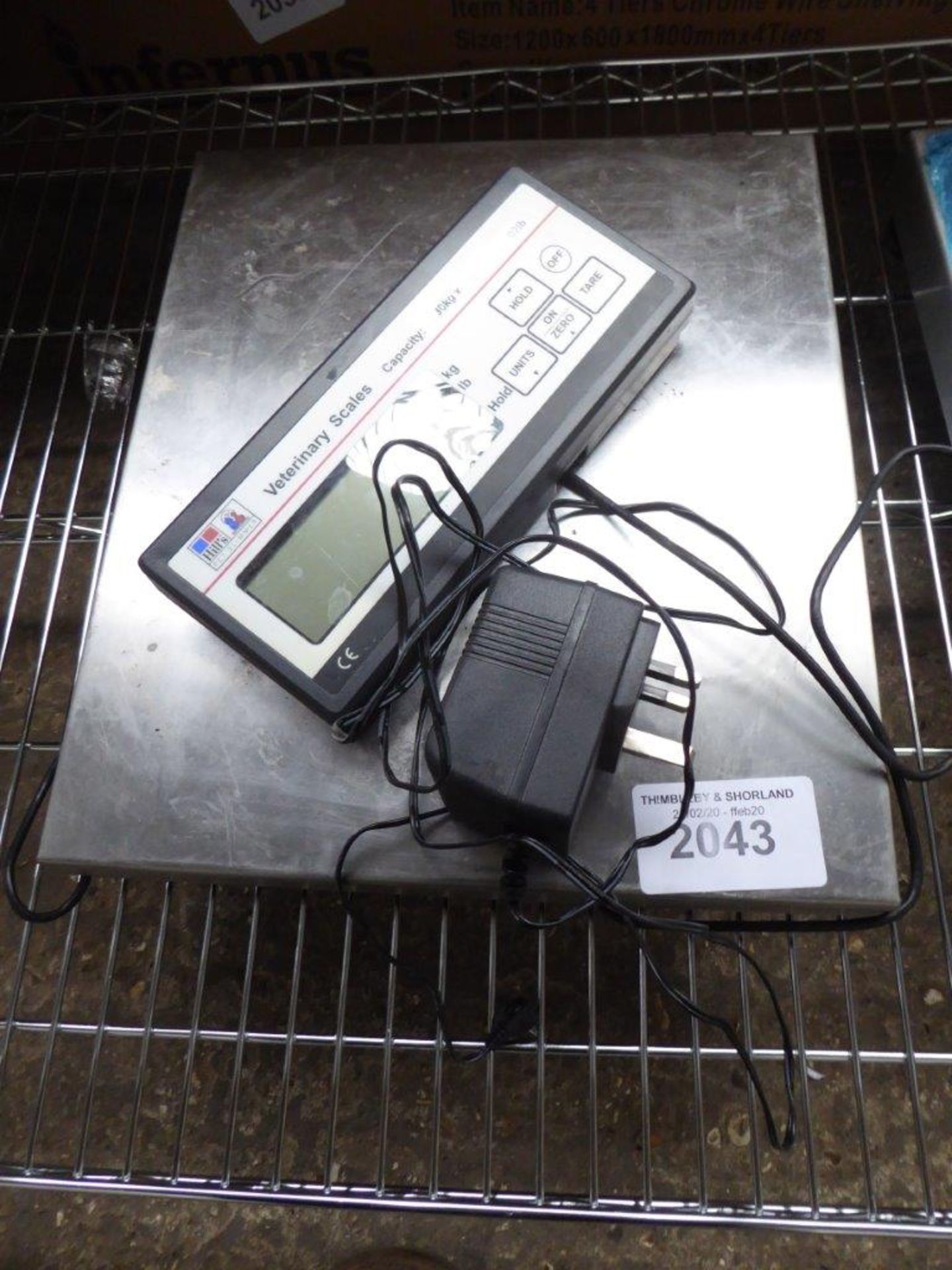 Digital weighing scales. Estimate £30-35.