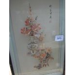 Framed and glazed oriental shell collage of vases with flowers.