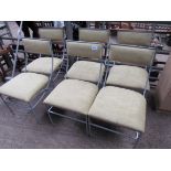 6 metal framed upholstered seat chairs.