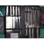 Samurai knife set in case. Estimate £50-55.