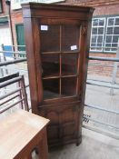 Oak corner cupboard.