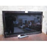 Samsung LE40A686MIF TV with remote.