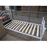 White metal framed single bed frame.