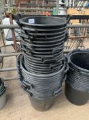 Quantity of large black planters.