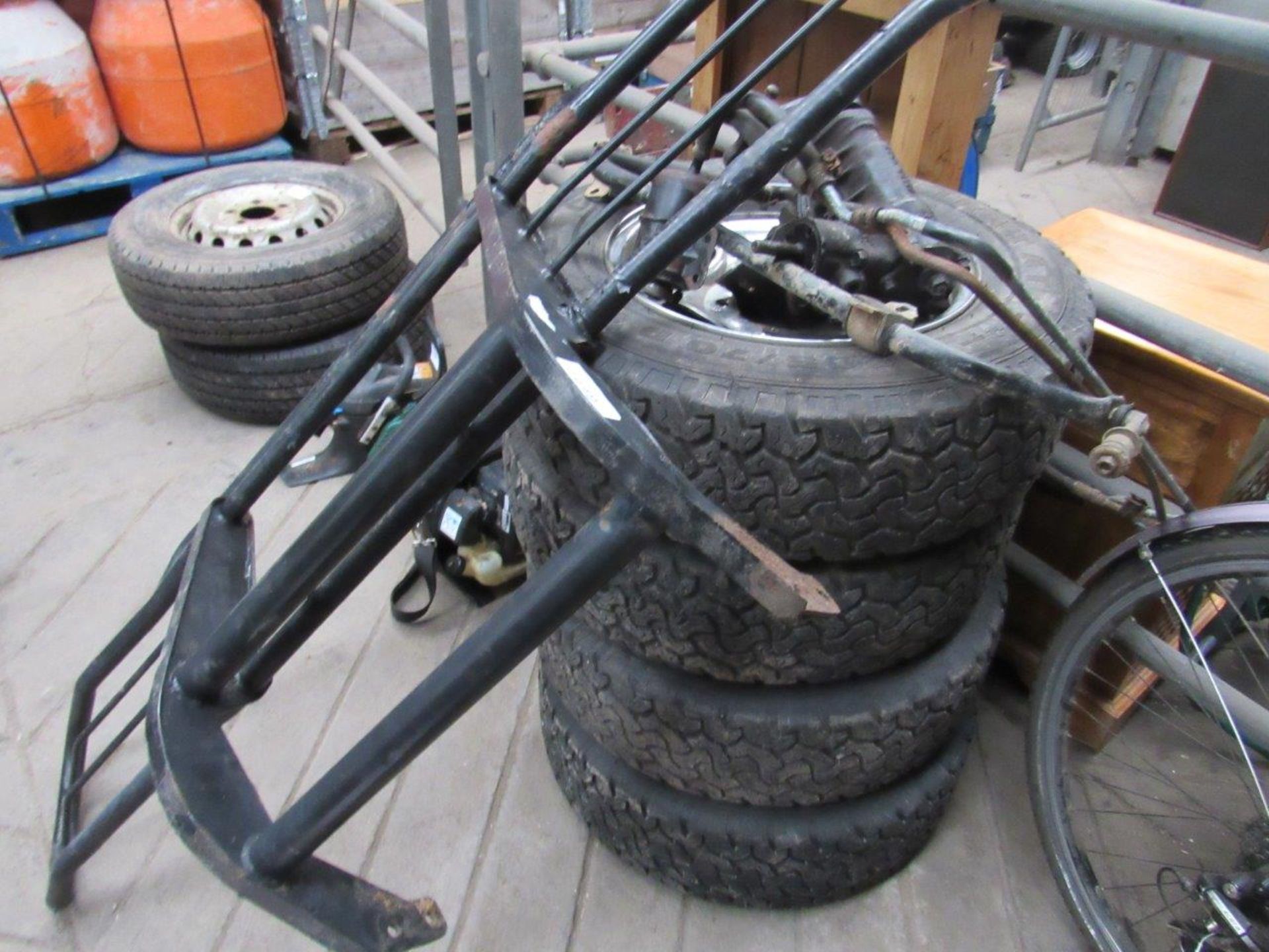 4 wheels and tyres and spare parts for a Suzuki Vitara.