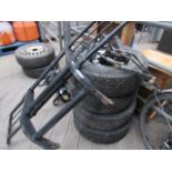 4 wheels and tyres and spare parts for a Suzuki Vitara.