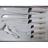 Waltmann 7 piece knife set in white. Estimate £15-20.