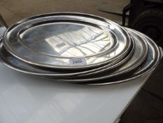 5 oval serving trays. Estimate £20-25.