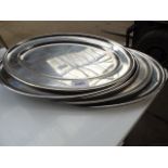 5 oval serving trays. Estimate £20-25.