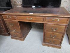 Oak leather top pedestal desk.