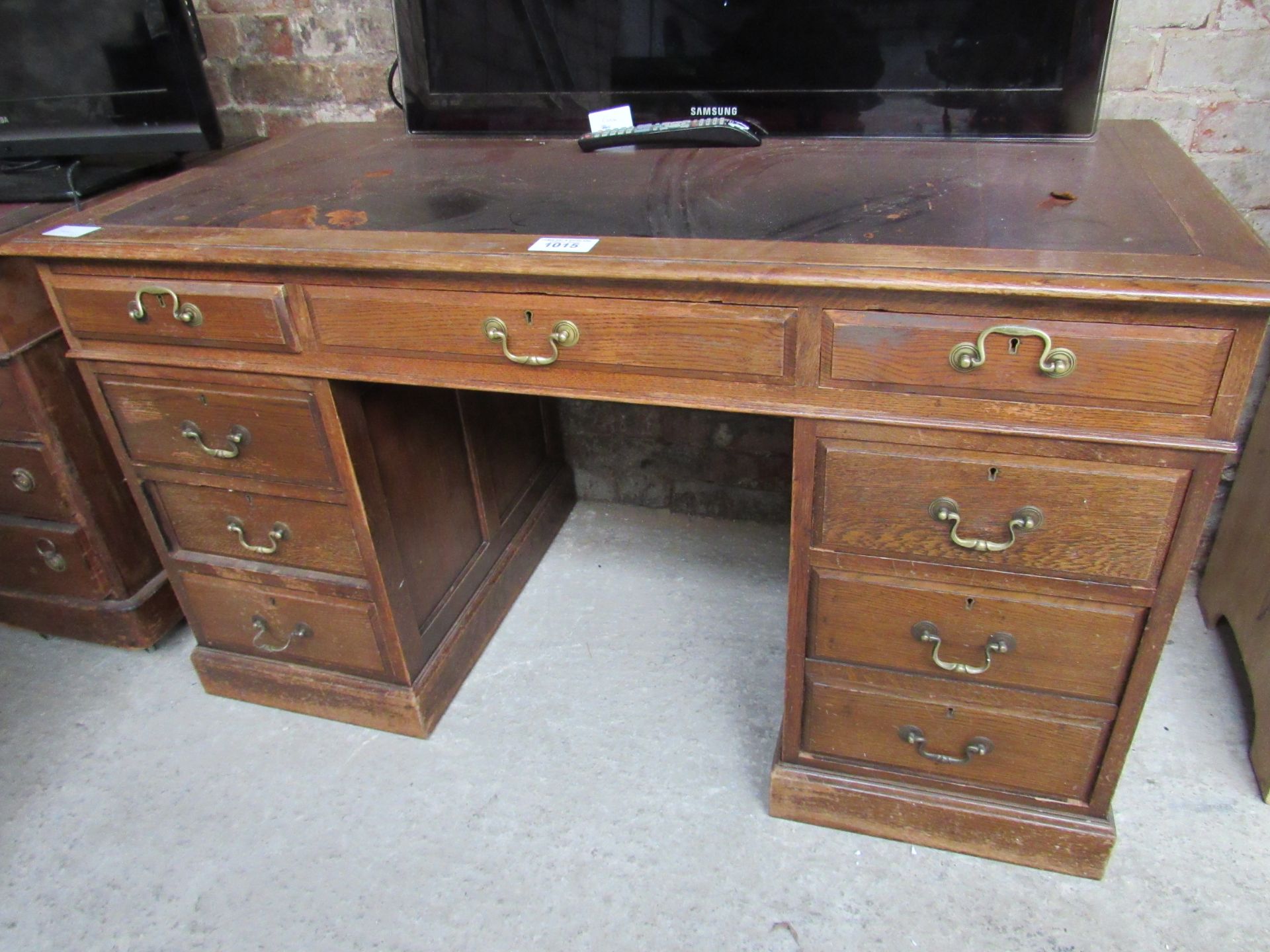 Oak leather top pedestal desk.