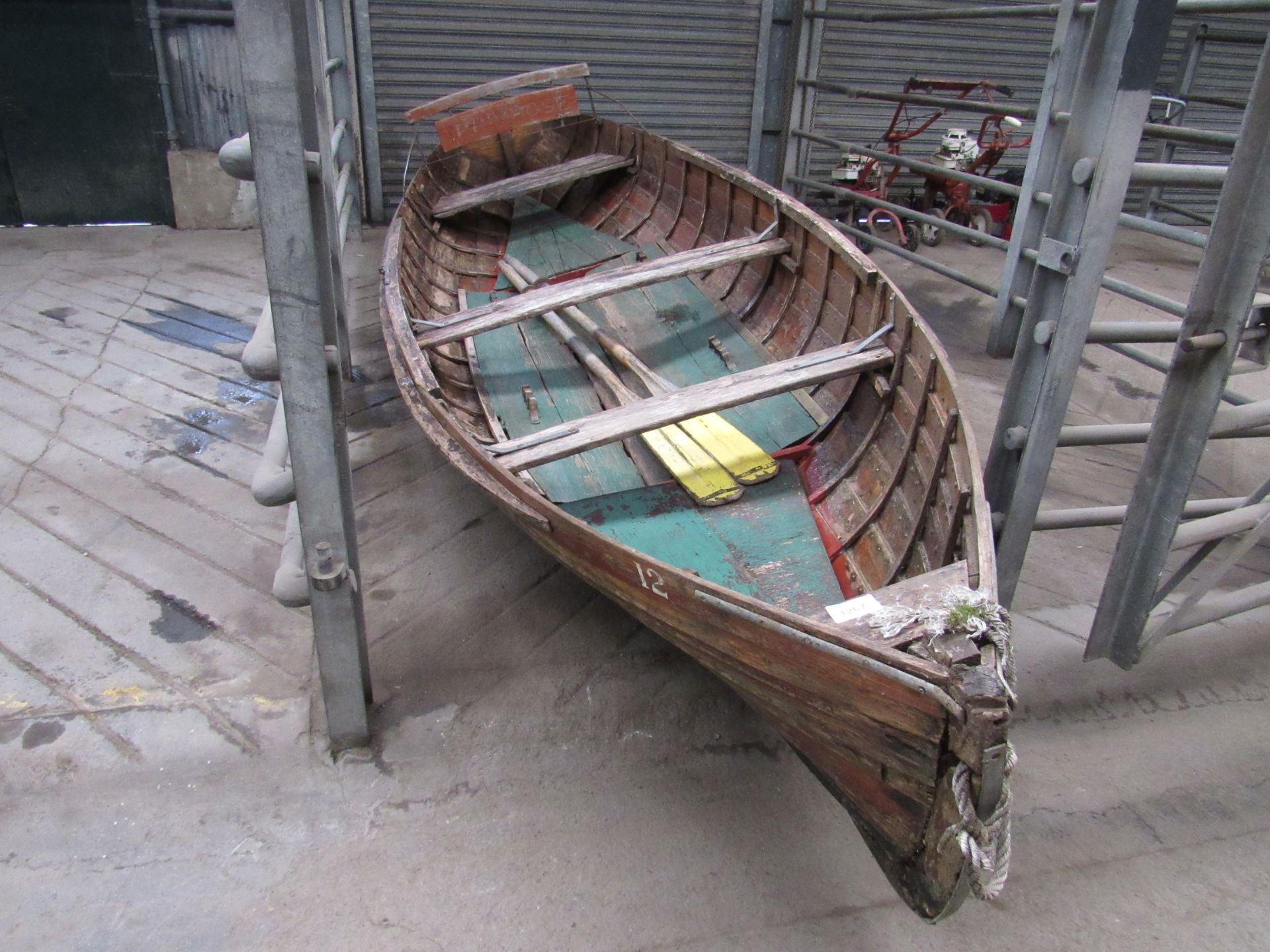 Approximately 16 foot Clinker built Edwardian Boating Lake Rowing Boat with high back seat. Complete