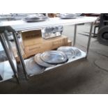 115cm new stainless steel table with shelf. Estimate £120-125.