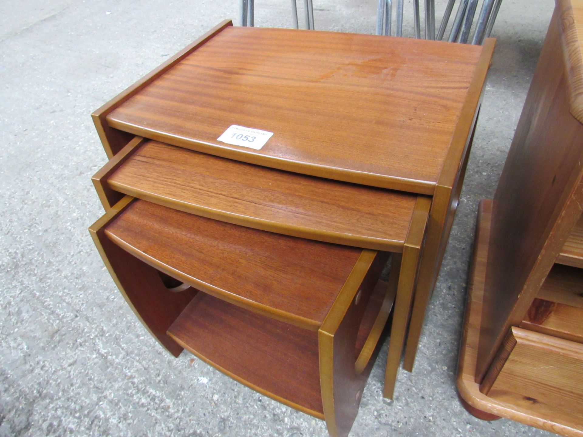 Hardwood nest of three tables.