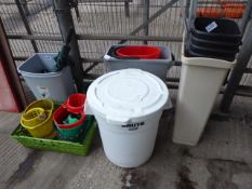 Quantity of bins and mop buckets.