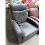 Leather effect electric recliner armchair.