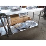 115cm new stainless steel table with shelf. Estimate £120-125.