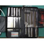 Samurai knife set in case. Estimate £50-55.