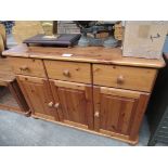 Pine sideboard with 3 drawers over 3 cupboards, 116 x 44 x 82cms.