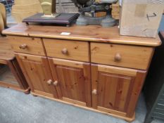 Pine sideboard with 3 drawers over 3 cupboards, 116 x 44 x 82cms.