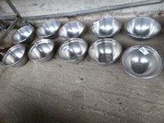 10 stainless steel bowls. Estimate £15-20.