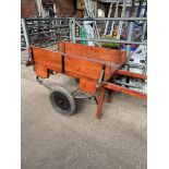 Large wooden 2 wheel barrow on sprung axle (Costermonger Barrow) Estimate £50-80.