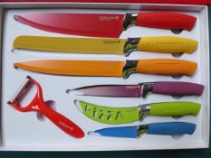 Waltmann 7 piece knife set coloured. Estimate £15-20.