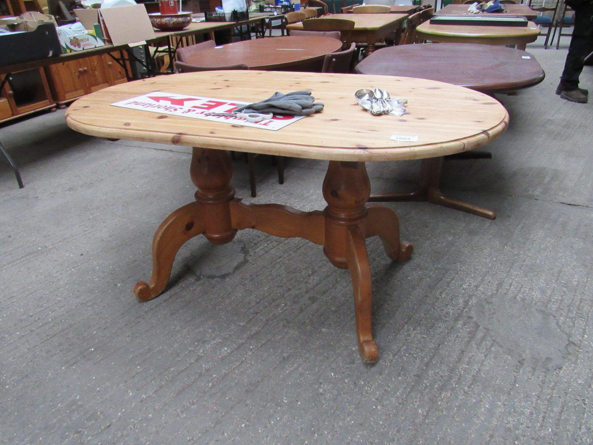 Pine oval shaped kitchen table.