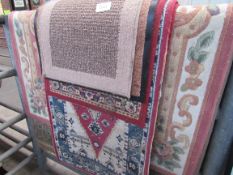 8 various rugs. Estimate £20-25.