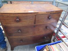 2 over 2 bow fronted mahogany chest of drawers.