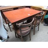 Extending dining table and 4 chairs.
