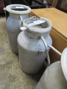 Milk churn with lid.