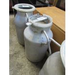 Milk churn with lid.