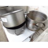 3 heavy duty cook pots. Estimate £30-35.