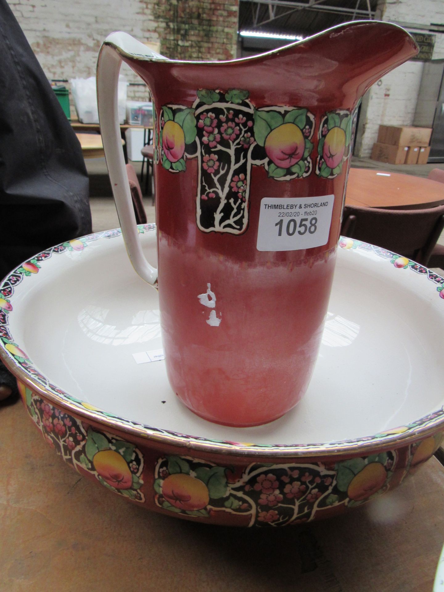 Decorative wash basin and jug with soap dish; carafe and another wash basin.