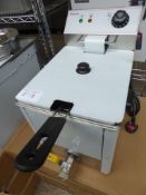 Single basket fryer with drain to front - Estimate £80-85.