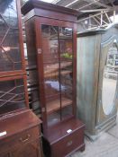 Mahogany glass fronted bookcase.