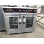 Moorwood Vulcan 6 burner gas cooker with convection oven and flame failure. Estimate £300-350.