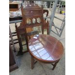 Over mantel mirror and glass top table.