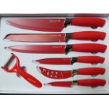 Waltmann 7 piece knife set in red. Estimate £15-20.