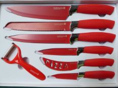 Waltmann 7 piece knife set in red. Estimate £15-20.