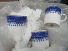 Box containing glass bells, drinking glasses, cups and saucers.