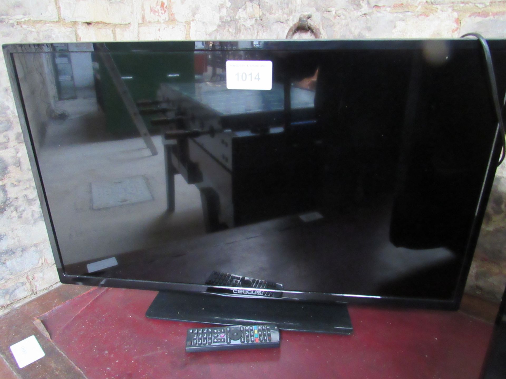 Celcus TV with remote.