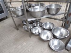 14 stainless steel bowls. Estimate £20-30.