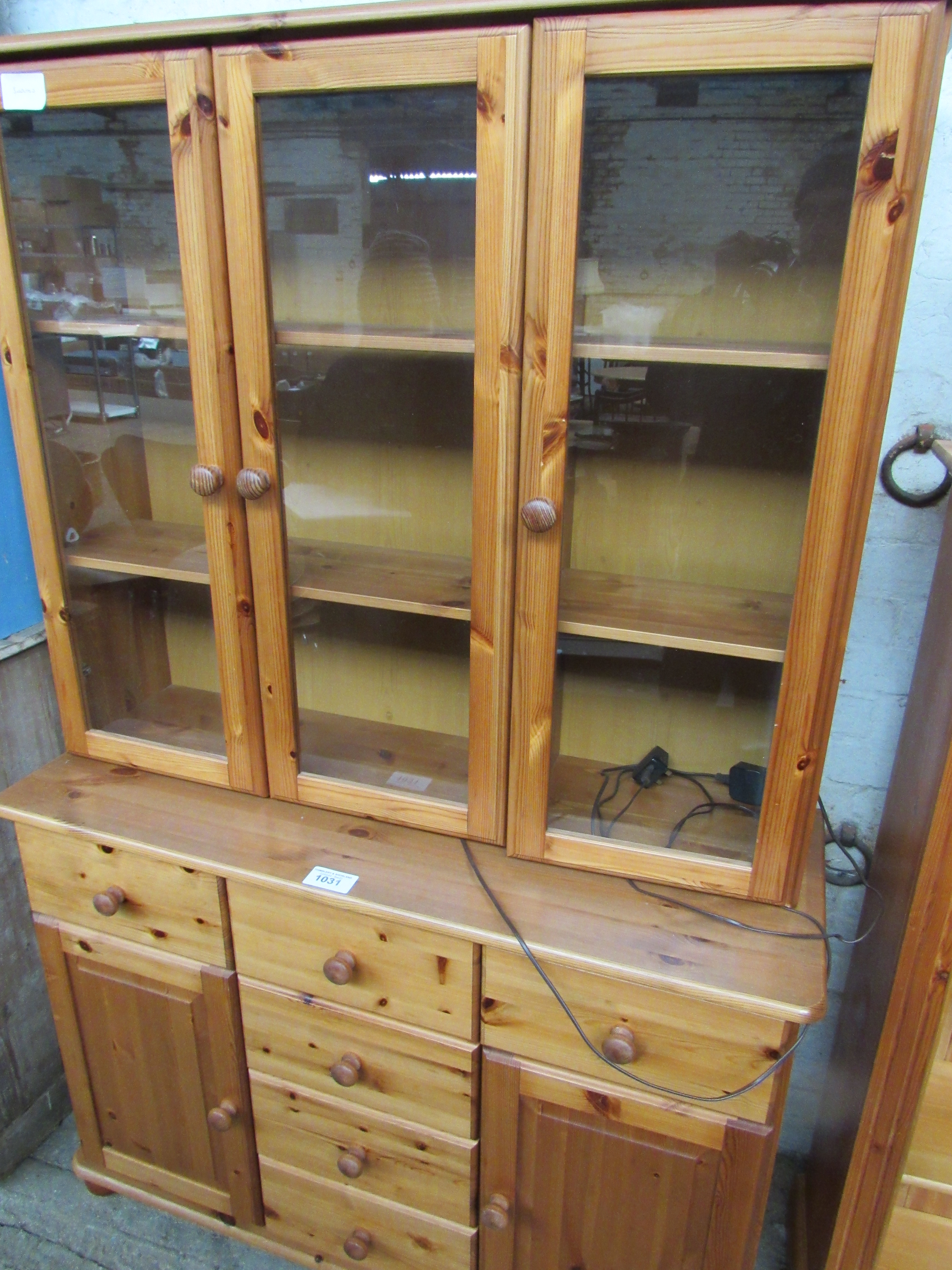 Pine glass top display cabinet with cupboard and drawers to base, 115 x 43 x 180cms.