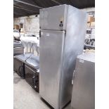 Stainless steel upright fridge. Estimate £100-125