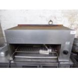 Large Falcon gas grill.