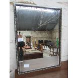 Bevelled edge wall mounted mirror with inlaid frame, 88 x 65cms.