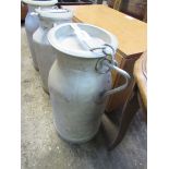 Milk churn with lid.