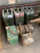3 old jerry cans and 4 paraffin cans.